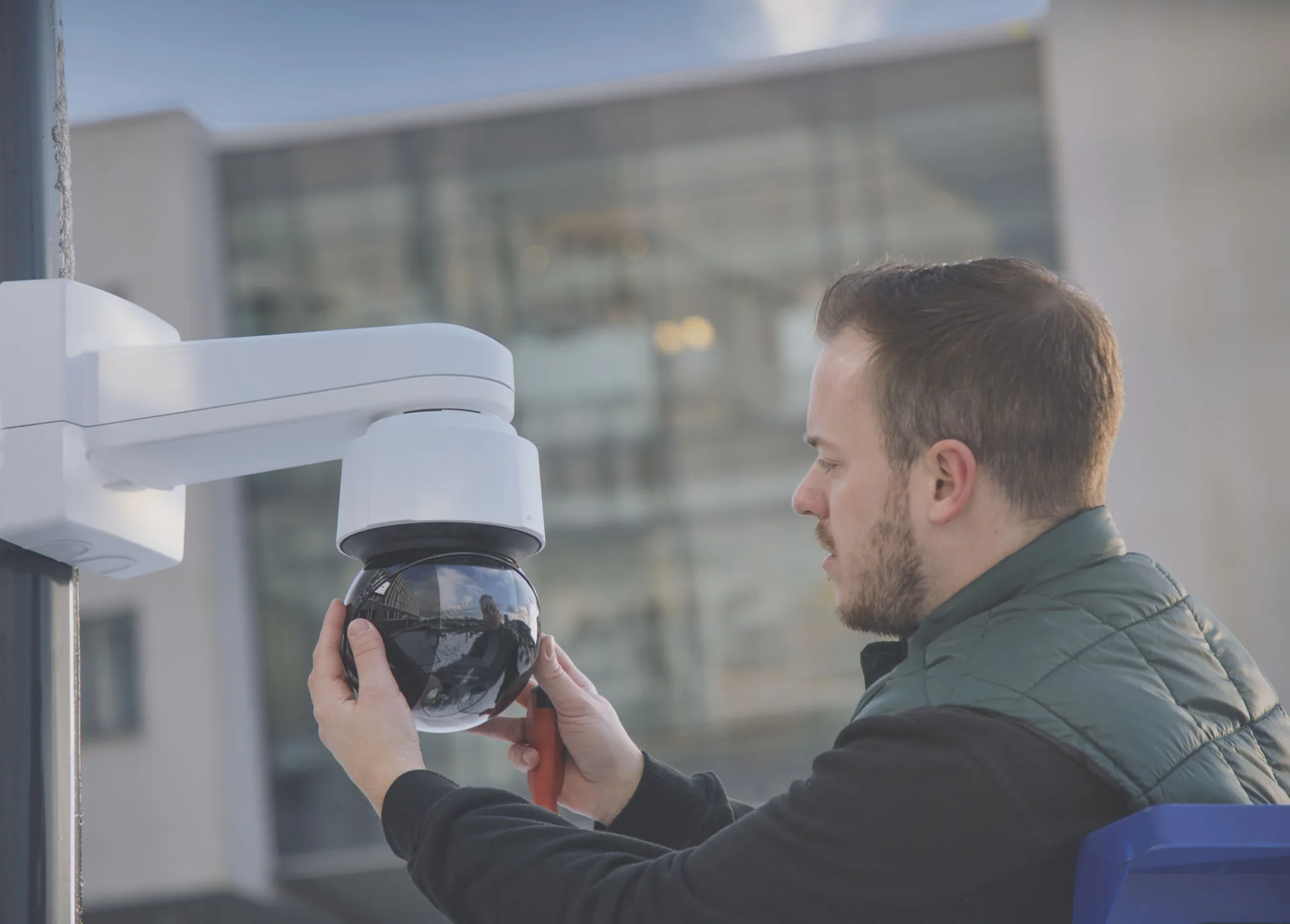 Security 4 Wales engineer installing CCTV camera