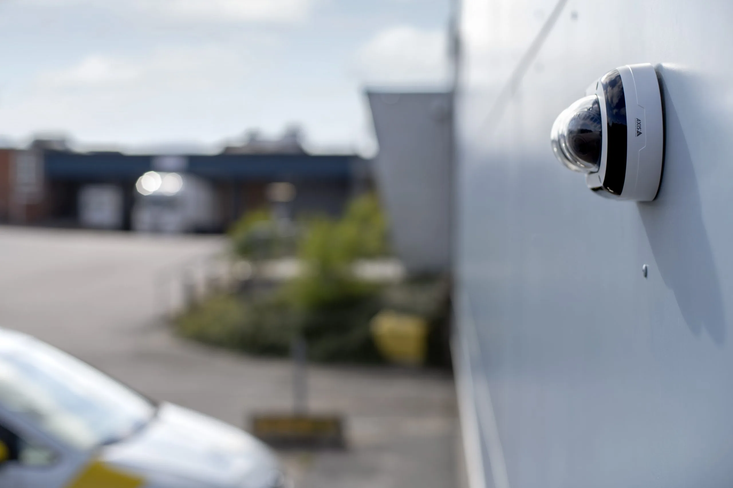 Axis dome CCTV camera mounted externally  -  Security 4 Wales